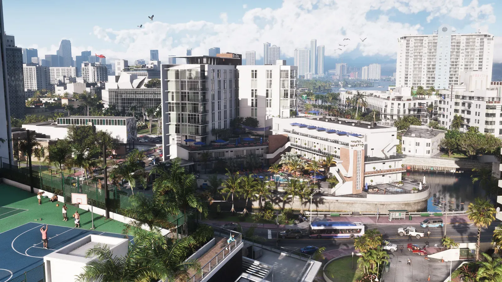 Una vista diurna sobre los tejados de Vice City y los barrios de casas bajas hacia el horizonte del centro en GTA 6