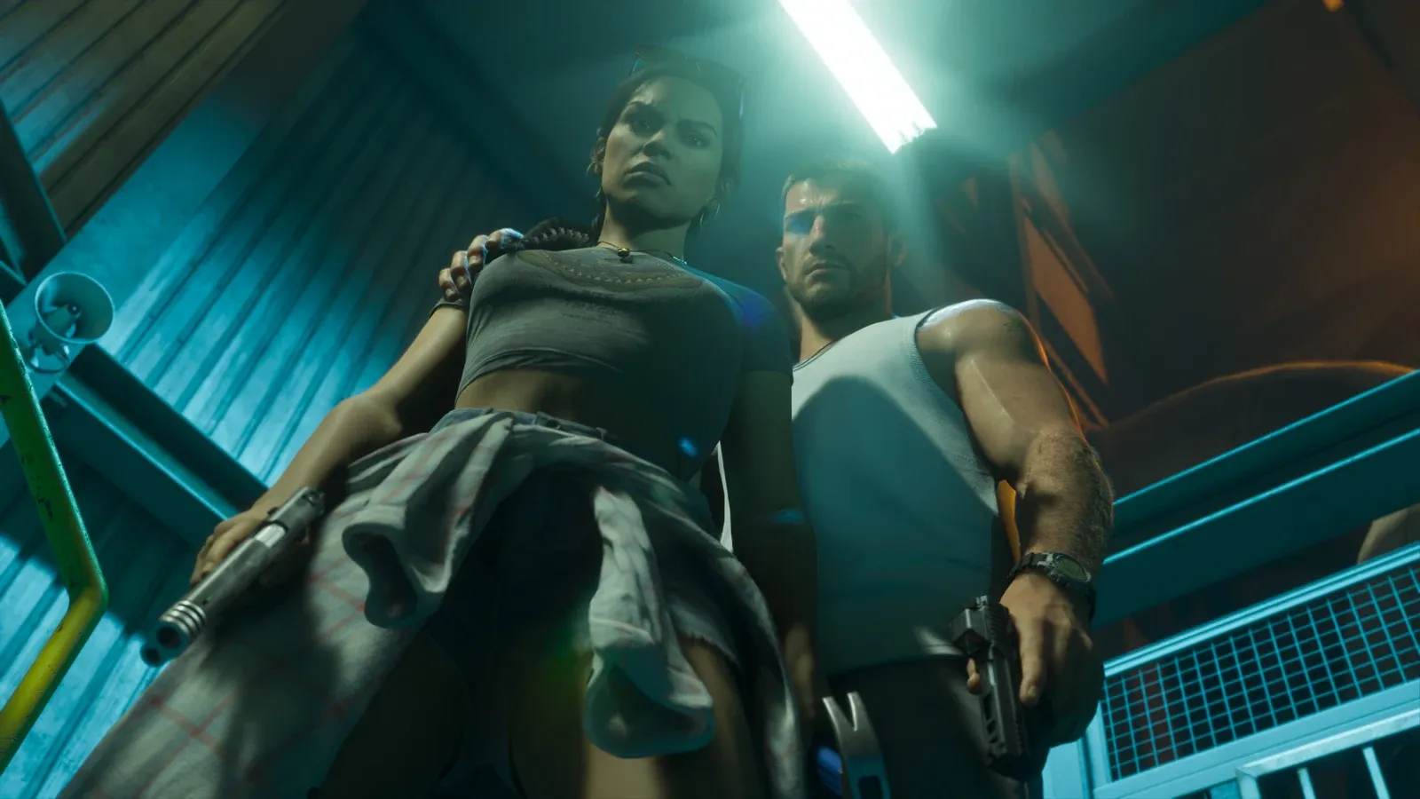 Jason and Lucia standing armed in a dimly lit stairwell in GTA 6, guns drawn during a robbery in progress